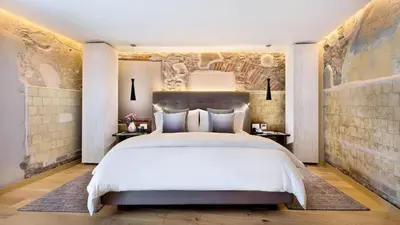 Cama o camas de una habitación en Cartesiano Boutique & Wellness Hotel