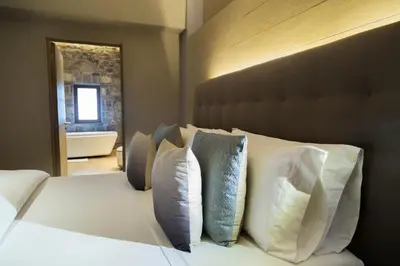 Cama o camas de una habitación en Cartesiano Boutique & Wellness Hotel