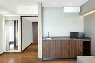 Una televisión o centro de entretenimiento en Courtyard by Marriott Puebla Las Animas