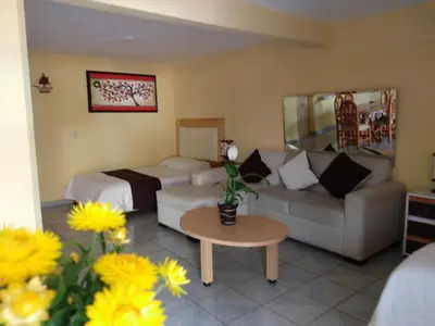 Zona de estar de El paraíso de Zacatlán DEPARTAMENTO con JARDÍN y Lumbrera, 11 personas