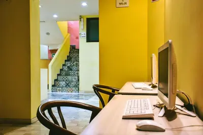 Una televisión o centro de entretenimiento en Hotel Boutique Casa Abuela Maria