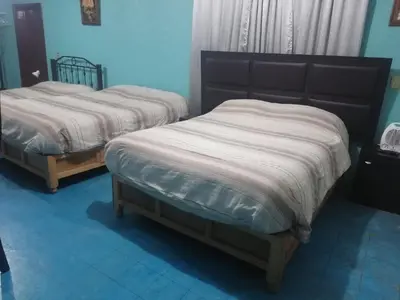 Cama o camas de una habitación en Hospedaje La Cienega