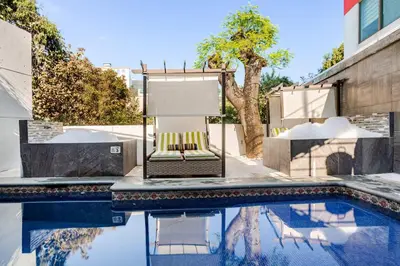 Piscina en o cerca de Lujoso y amplio Loft con alberca climatizada y amplia cama para alberca, Cuernavaca somos los únicos en ofrecerte 2 jacuzzis premium con agua caliente y sistema de hidromasaje tipo spa, terraza panorámica con asador de carbon y mas amenidades!