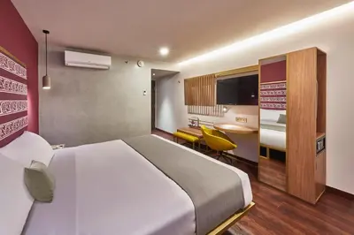 Cama o camas de una habitación en City Centro by Marriott Oaxaca