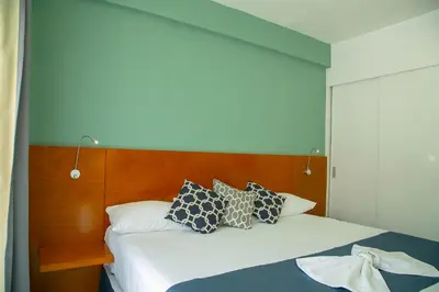 Cama o camas de una habitación en Relax Inn Suites