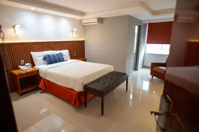Cama o camas de una habitación en Hotel Atenas