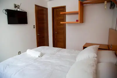 Cama o camas de una habitación en Comala Bed & Breakfast