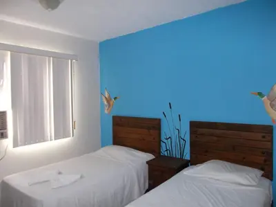Cama o camas de una habitación en Inmobiliaria Percales