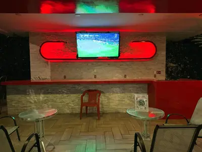 Una televisión o centro de entretenimiento en Hotel Palmas Cocoyoc