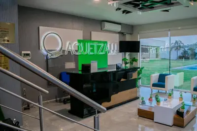 Una televisión o centro de entretenimiento en Hotel Aquetzalli