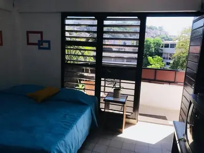 Cama o camas de una habitación en Hotel El Kiosco