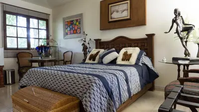 Cama o camas de una habitación en El Jardín del Edén B&B Boutique
