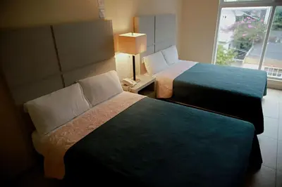 Cama o camas de una habitación en Hotel Boutique Boca - Veracruz