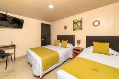 Cama o camas de una habitación en Hotel Boutique Las Campanas