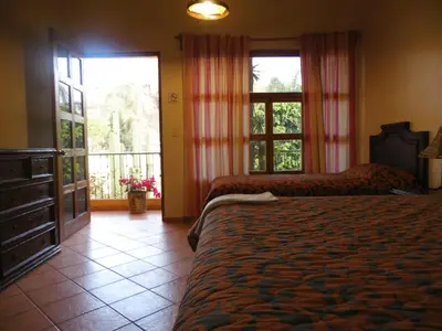 Cama o camas de una habitación en Hotel Plaza del Sol