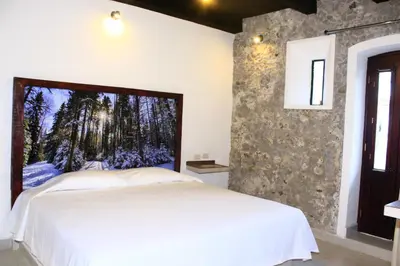 Cama o camas de una habitación en Hotel Atzalan