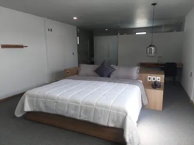 Cama o camas de una habitación en Oaxaca Inn Reforma