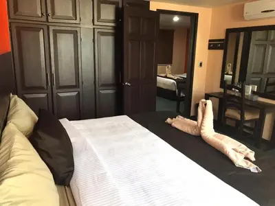 Cama o camas de una habitación en Oaxaca Inn Reforma