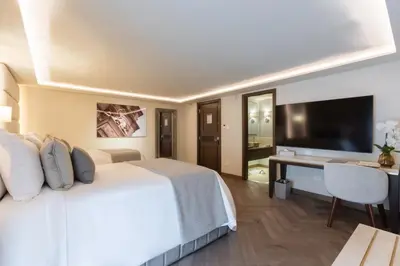 Cama o camas de una habitación en Quinta Real Puebla