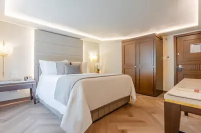 Cama o camas de una habitación en Quinta Real Puebla