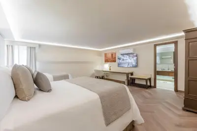Cama o camas de una habitación en Quinta Real Puebla