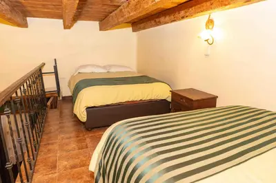 Cama o camas de una habitación en La Casona de los Gómez