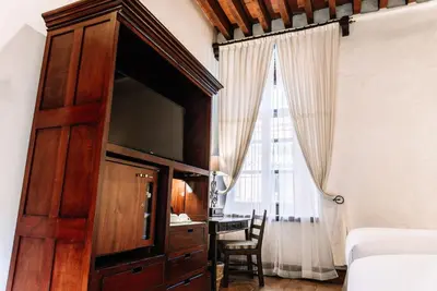Cama o camas de una habitación en Quinta Real Oaxaca