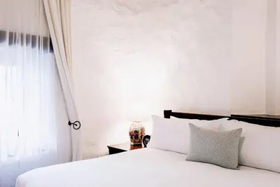 Cama o camas de una habitación en Quinta Real Oaxaca