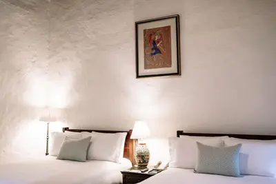 Cama o camas de una habitación en Quinta Real Oaxaca