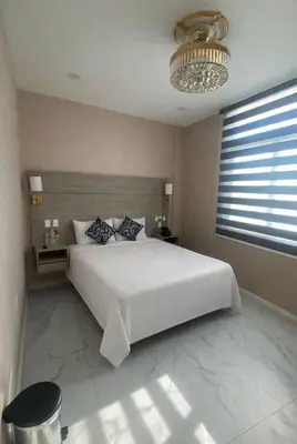 Cama o camas de una habitación en Hotel Cacaxtla