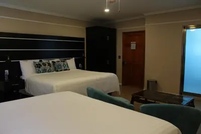 Cama o camas de una habitación en Hotel Cacaxtla