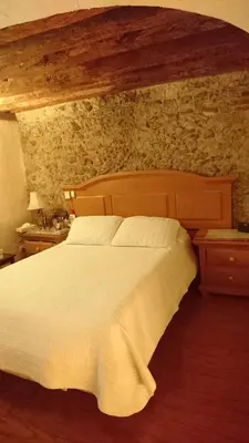 Cama o camas de una habitación en Mesón de Santa Teresa