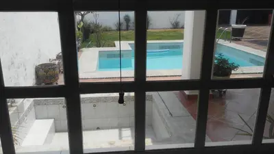 Piscina en o cerca de Casa privada para descanso, se renta para 8 personas completa Y tambien por habitacion con baño privado para 2 o 4 personas compartiendo areas comunes