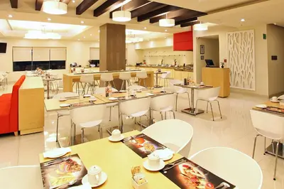 Un restaurante o sitio para comer en Fiesta Inn Coatzacoalcos