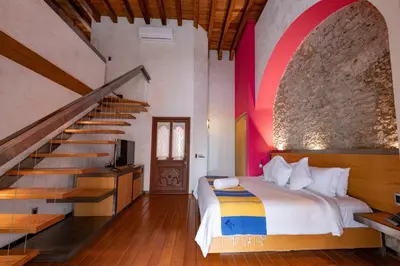 Cama o camas de una habitación en Hotel Boutique Casona de la China Poblana - Adults Only