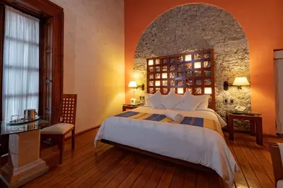 Cama o camas de una habitación en Hotel Boutique Casona de la China Poblana - Adults Only