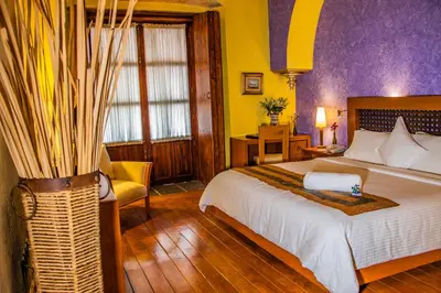Cama o camas de una habitación en Hotel Boutique Casona de la China Poblana - Adults Only