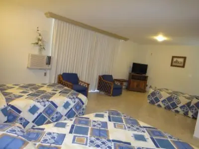 Cama o camas de una habitación en Parque Inn Hotel & Suites