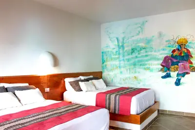 Cama o camas de una habitación en Axkan Arte Hotel Tuxtla