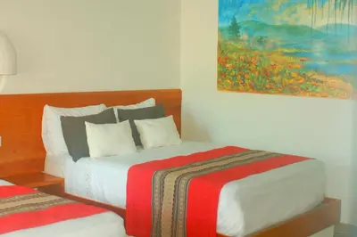 Cama o camas de una habitación en Axkan Arte Hotel Tuxtla