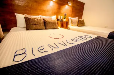Cama o camas de una habitación en Hotel del Carmen, en el Centro- DESAYUNO Incluido !