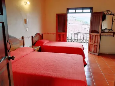 Cama o camas de una habitación en El Encuentro
