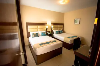 Cama o camas de una habitación en Hotel San Miguel, en el Centro - Desayuno Incluido