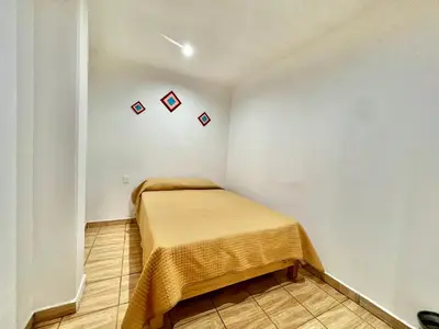 Cama o camas de una habitación en Hostal Amate Taxco