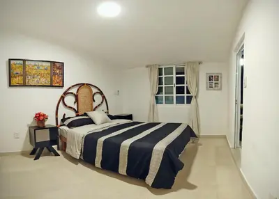 Cama o camas de una habitación en HominngBird Acapulco