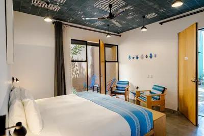 Cama o camas de una habitación en Hotel con Corazón Oaxaca