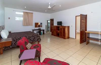 Una televisión o centro de entretenimiento en Hotel Casa Pridda