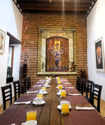Un restaurante o sitio para comer en Hotel Siglo 17