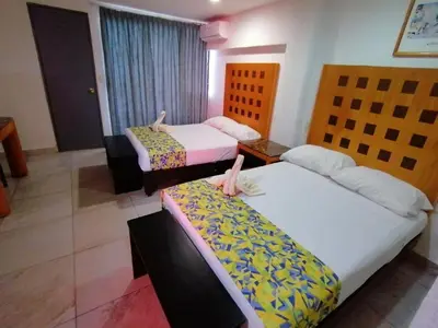 Cama o camas de una habitación en Hotel Ziami