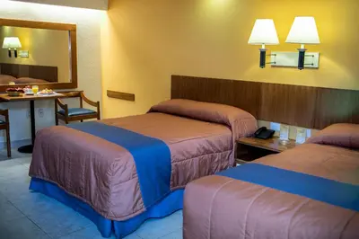 Cama o camas de una habitación en Hotel Jaragua